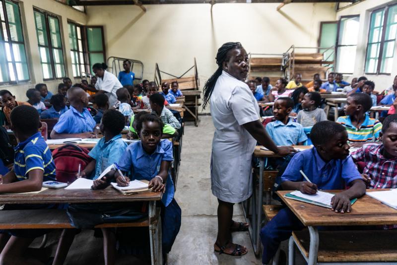 Seventh-grade teachers Rita Ibrahim John, left, and Anotinia Marquez Bero, right, must share a single room to teach their two classes. Cyclone Idai destroyed 32 classrooms at Eduardo Mondlane Primary Completion School in Mozambique. Seventh-grade teachers Rita Ibrahim John, left, and Anotinia Marquez Bero, right, must share a single room to teach their two classes. Cyclone Idai destroyed 32 classrooms at Eduardo Mondlane Primary Completion School in Mozambique.