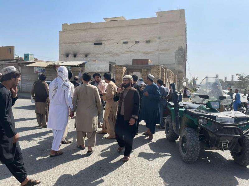 People gather at the scene after a bomb blast hits a Shiite mosque in Afghanistan's southern Kandahar province on Friday. People gather at the scene after a bomb blast hits a Shiite mosque in Afghanistan's southern Kandahar province on Friday.
