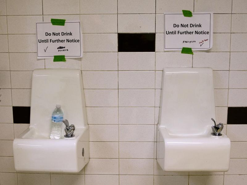 Drinking fountains are marked "Do Not Drink Until Further Notice" at Flint Northwestern High School in Flint, Mich., in May 2016. After 18 months of insisting that water drawn from the Flint River was safe to drink, officials admitted it was not. Drinking fountains are marked "Do Not Drink Until Further Notice" at Flint Northwestern High School in Flint, Mich., in May 2016. After 18 months of insisting that water drawn from the Flint River was safe to drink, officials admitted it was not.