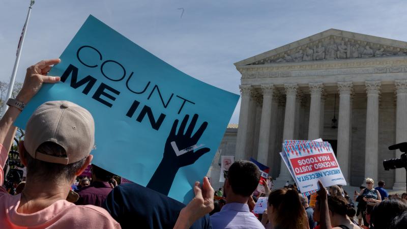 Protesters holding signs about the 2020 census gather outside the Supreme Court in Washington, D.C., in 2019. Protesters holding signs about the 2020 census gather outside the Supreme Court in Washington, D.C., in 2019.