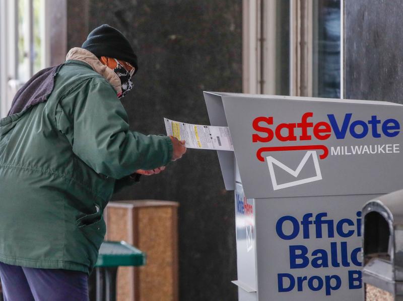 A woman casts her ballot at the Frank P. Zeidler Municipal Building on the first day of in-person early voting for the in Milwaukee last week. A woman casts her ballot at the Frank P. Zeidler Municipal Building on the first day of in-person early voting for the in Milwaukee last week.