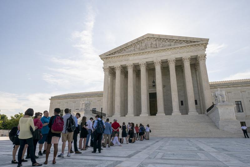 Visitors lined up at the Supreme Court in Washington, D.C., on Monday morning as the justices prepared to hand down decisions. Visitors lined up at the Supreme Court in Washington, D.C., on Monday morning as the justices prepared to hand down decisions.