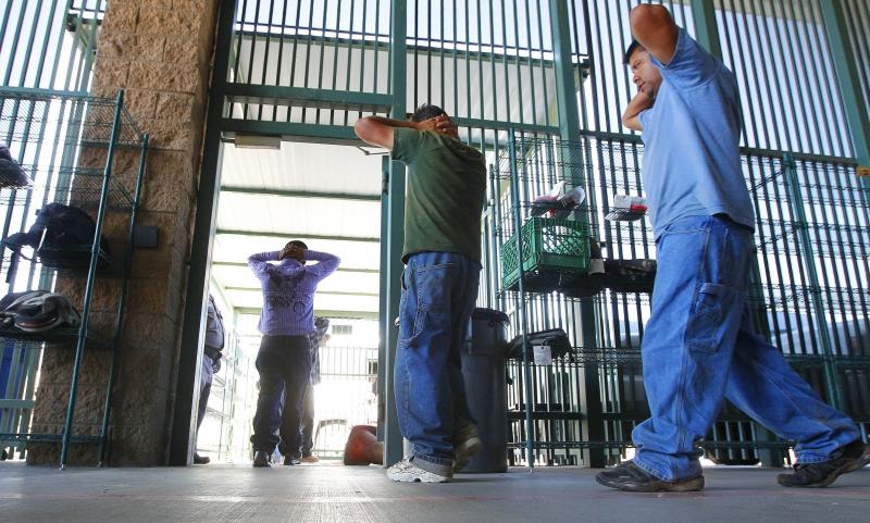 Immigrants suspected of being in the U.S. illegally are transferred to be processed at the Tucson sector of the U.S. Customs and Border Protection headquarters in Arizona in 2016. Immigrants suspected of being in the U.S. illegally are transferred to be processed at the Tucson sector of the U.S. Customs and Border Protection headquarters in Arizona in 2016.