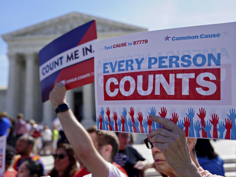 Demonstrators hold signs about the 2020 census outside the U.S. Supreme Court in 2019. Demonstrators hold signs about the 2020 census outside the U.S. Supreme Court in 2019.