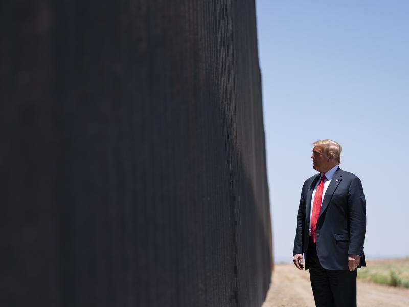 President Trump tours a section of the border wall in San Luis, Ariz., on June 23. The Supreme Court is agreeing to review a Trump administration policy that makes asylum-seekers wait in Mexico for U.S. court hearings. President Trump tours a section of the border wall in San Luis, Ariz., on June 23. The Supreme Court is agreeing to review a Trump administration policy that makes asylum-seekers wait in Mexico for U.S. court hearings.
