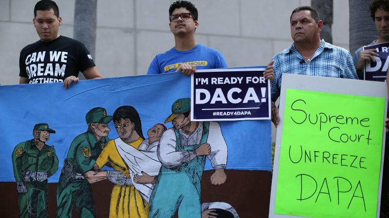 Immigration activists rally in Miami ahead of the Supreme Court hearing arguments on President Obama's executive actions on immigration Monday. Immigration activists rally in Miami ahead of the Supreme Court hearing arguments on President Obama's executive actions on immigration Monday.