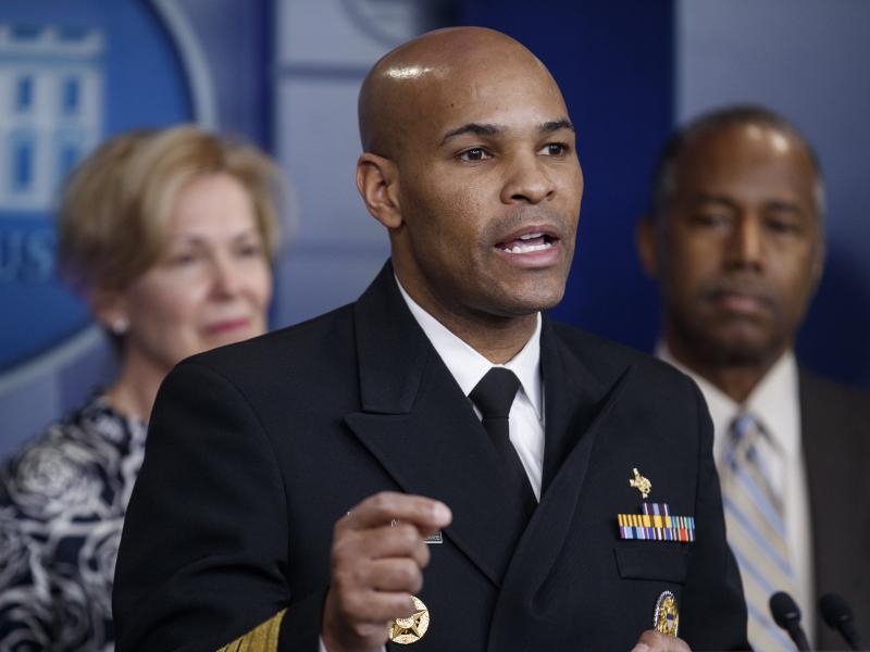 U.S. Surgeon General Jerome Adams, shown here during a news conference at the White House last month, said Tuesday that he expects some places to be able to "slowly reopen" after the end of April. U.S. Surgeon General Jerome Adams, shown here during a news conference at the White House last month, said Tuesday that he expects some places to be able to "slowly reopen" after the end of April.