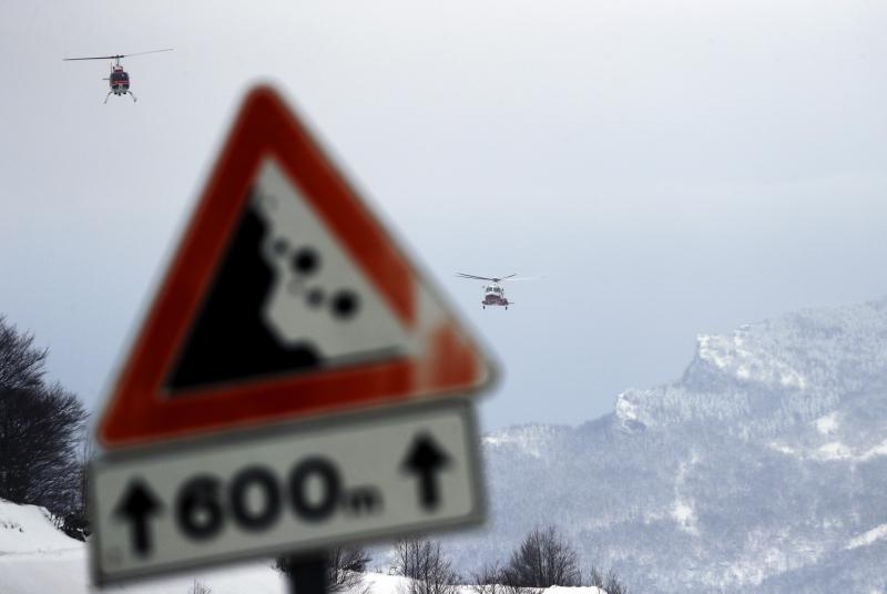 On Friday, Italian rescue helicopters approach the area of the Hotel Rigopiano, which was buried by an avalanche on Wednesday, to help airlift out some people found alive in the debris. On Friday, Italian rescue helicopters approach the area of the Hotel Rigopiano, which was buried by an avalanche on Wednesday, to help airlift out some people found alive in the debris.