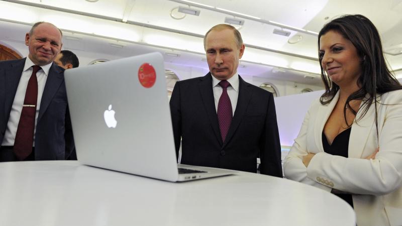 RT Editor-in-Chief Margarita Simonyan is seen with Russian President Vladimir Putin and Kremlin's first deputy chief of staff, Alexei Gromov, as they marked RT's 10th anniversary in Moscow in 2015. RT Editor-in-Chief Margarita Simonyan is seen with Russian President Vladimir Putin and Kremlin's first deputy chief of staff, Alexei Gromov, as they marked RT's 10th anniversary in Moscow in 2015.