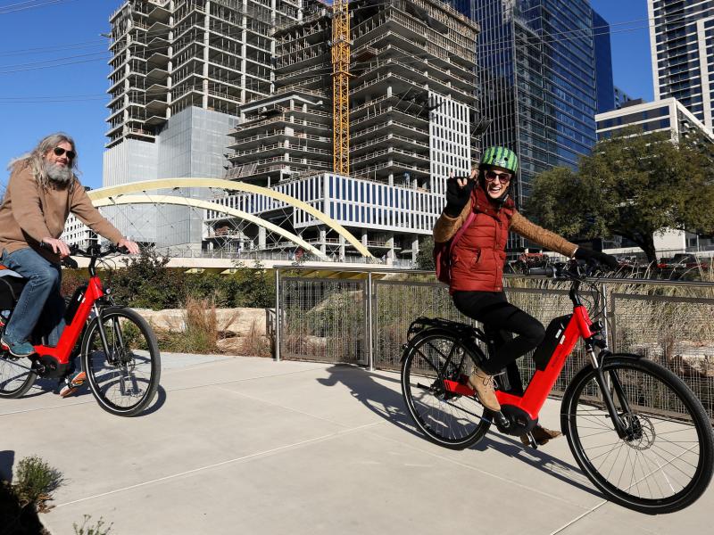 Joel Parker (left) and Leigh Salinas (right), participants in the Center for Austin's Future ATXelerator program, take a bike tour through the city on Jan. 13, 2018. Joel Parker (left) and Leigh Salinas (right), participants in the Center for Austin's Future ATXelerator program, take a bike tour through the city on Jan. 13, 2018.