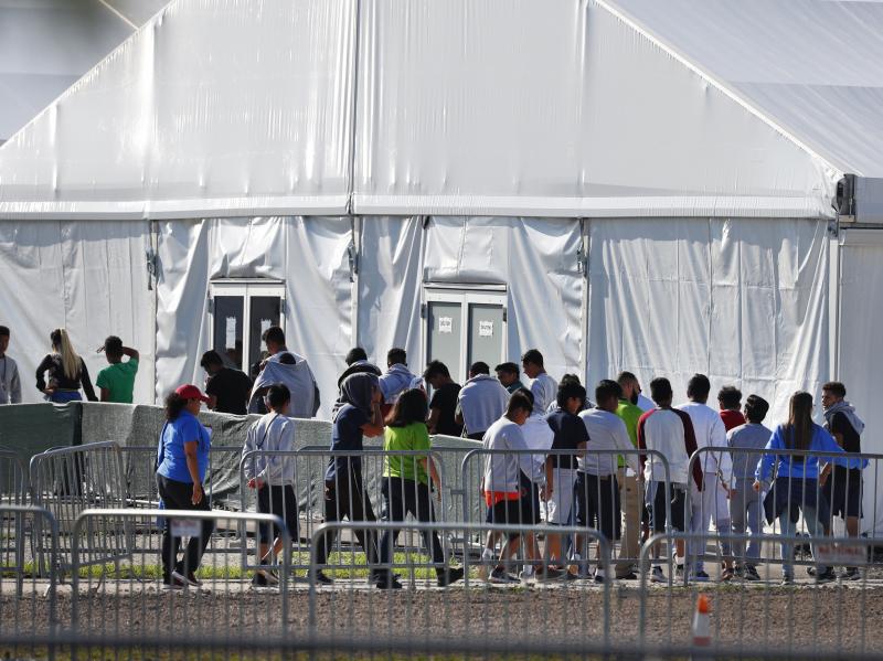 Children line up in February 2018 to enter a tent at the Homestead Temporary Shelter for Unaccompanied Children in Homestead, Fla. Many of these kids were taken from their parents after crossing the border illegally. Children line up in February 2018 to enter a tent at the Homestead Temporary Shelter for Unaccompanied Children in Homestead, Fla. Many of these kids were taken from their parents after crossing the border illegally.