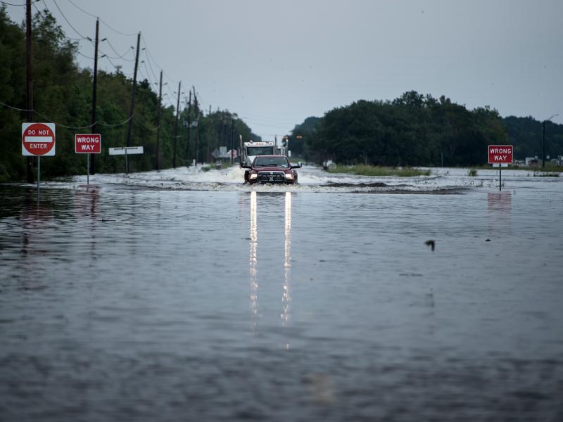 A flooded road leading to the Arkema chemical plant near Houston, Texas in August 2017. Multiple employees including the plant manager are facing criminal charges for allegedly failing to adequately prepare for flooding that caused massive chemical fires A flooded road leading to the Arkema chemical plant near Houston, Texas in August 2017. Multiple employees including the plant manager are facing criminal charges for allegedly failing to adequately prepare for flooding that caused massive chemical fires