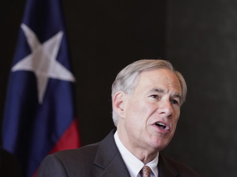 Texas Gov Greg Abbott pictured in March. He has threatened to block the pay of lawmakers who left the state House chamber rather than vote on a bill they say would make it harder to vote. Texas Gov Greg Abbott pictured in March. He has threatened to block the pay of lawmakers who left the state House chamber rather than vote on a bill they say would make it harder to vote.