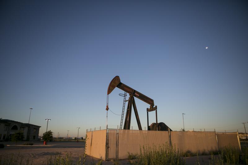 Pump jacks dot the landscape outside Midland, a West Texas oil town. Pump jacks dot the landscape outside Midland, a West Texas oil town.