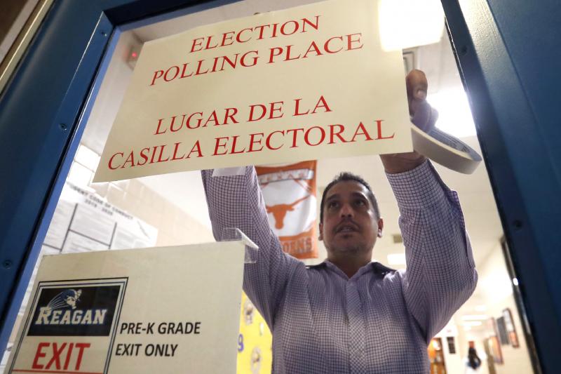 An election worker in Dallas setting up a polling place ahead of the March 3 in Texas. Texas officials are resisting efforts to expand mail-in voting due to the pandemic and insisting that voters cast ballots in person in upcoming elections. An election worker in Dallas setting up a polling place ahead of the March 3 in Texas. Texas officials are resisting efforts to expand mail-in voting due to the pandemic and insisting that voters cast ballots in person in upcoming elections.