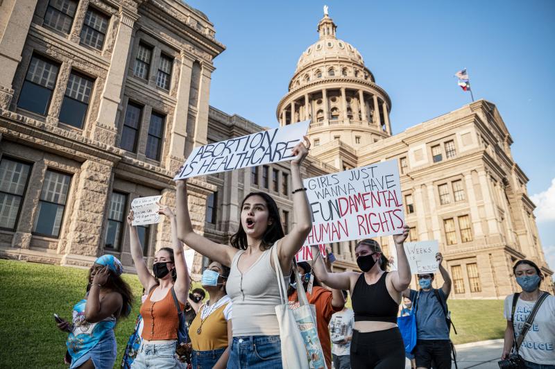 Abortion-rights supporters march outside the Texas Capitol in Austin on Sept. 1. Abortion-rights supporters march outside the Texas Capitol in Austin on Sept. 1.