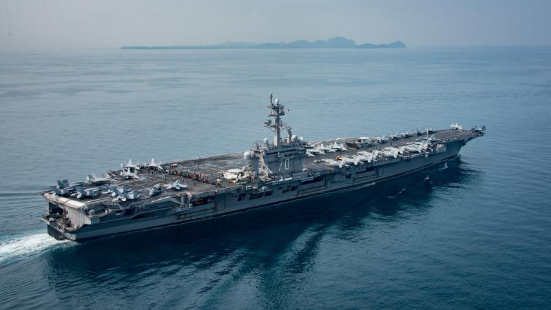An official photograph dated April 15 and posted by the Navy shows the aircraft carrier USS Carl Vinson in an Indonesian strait thousands of miles south of North Korea. An official photograph dated April 15 and posted by the Navy shows the aircraft carrier USS Carl Vinson in an Indonesian strait thousands of miles south of North Korea.