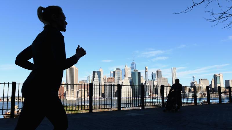 A woman jogging in New York City. NPR Music's Lyndsey McKenna has been running to relieve stress during the coronavirus pandemic. A woman jogging in New York City. NPR Music's Lyndsey McKenna has been running to relieve stress during the coronavirus pandemic.