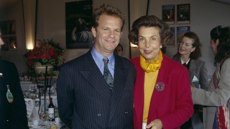 Liliane Bettencourt and François-Marie Banier attend a cosmetics industry event in 1992. Liliane Bettencourt and François-Marie Banier attend a cosmetics industry event in 1992.