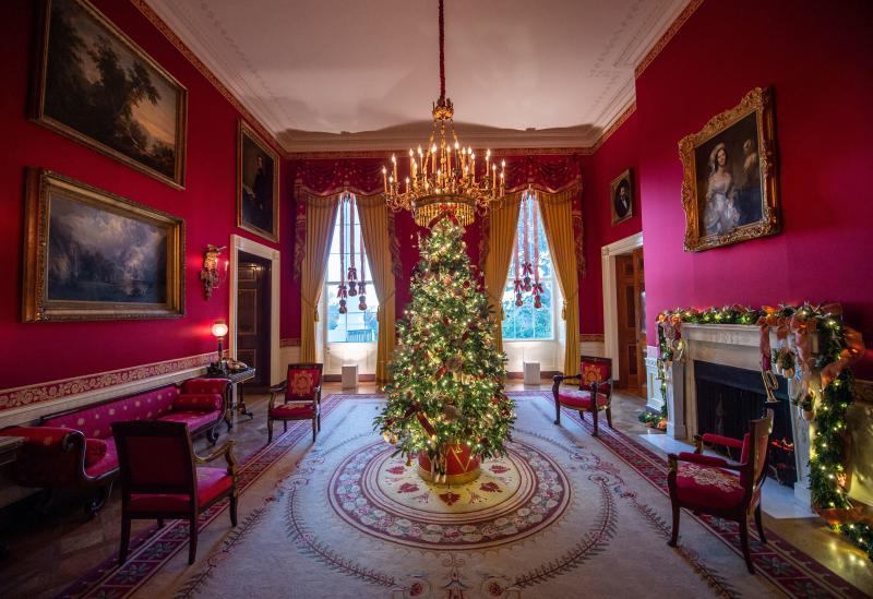 A Christmas tree stands in the Red Room during a press preview of White House holiday decorations on Nov. 29. A Christmas tree stands in the Red Room during a press preview of White House holiday decorations on Nov. 29.