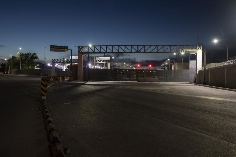 A view of the border bridge in Ciudad Acuna, Mexico, Friday evening, Sept. 24, 2021, across the Rio Grande river from Del Rio, Texas. A view of the border bridge in Ciudad Acuna, Mexico, Friday evening, Sept. 24, 2021, across the Rio Grande river from Del Rio, Texas.