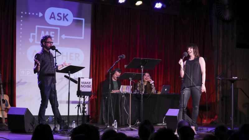 Ophira Eisenberg performs on stage alongside Jonathan Coulton on Ask Me Another at the Bell House in Brooklyn, New York. Ophira Eisenberg performs on stage alongside Jonathan Coulton on Ask Me Another at the Bell House in Brooklyn, New York.