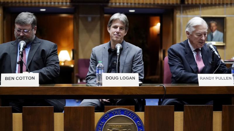 Cyber Ninjas CEO Doug Logan (center) is flanked by Ben Cotton (left), founder of digital security firm CyFIR, and Randy Pullen, former chair of the Arizona Republican Party, before the Arizona Senate Republicans' hearing Friday on the review of the 2020 p Cyber Ninjas CEO Doug Logan (center) is flanked by Ben Cotton (left), founder of digital security firm CyFIR, and Randy Pullen, former chair of the Arizona Republican Party, before the Arizona Senate Republicans' hearing Friday on the review of the 2020 p