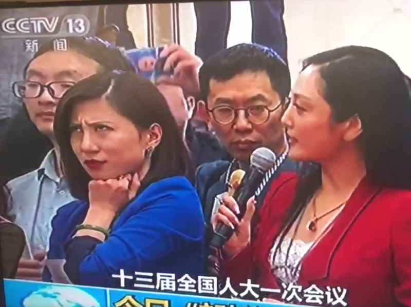 A screenshot of Liang Xiangyi, a financial news reporter, who was so disgusted by a fellow reporter's softball question to a government official at this week's National People's Congress that she was caught on live television rolling her eyes. The moment A screenshot of Liang Xiangyi, a financial news reporter, who was so disgusted by a fellow reporter's softball question to a government official at this week's National People's Congress that she was caught on live television rolling her eyes. The moment