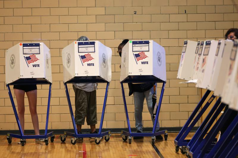 People vote during the Primary Election Day at P.S. 249 The Caton School on June 22 in the Flatbush neighborhood of Brooklyn borough in New York City. People vote during the Primary Election Day at P.S. 249 The Caton School on June 22 in the Flatbush neighborhood of Brooklyn borough in New York City.