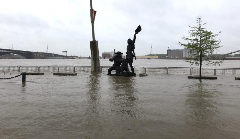 A statue of explorers Lewis and Clark is surrounded by floodwaters along the St. Louis riverfront on Thursday. A statue of explorers Lewis and Clark is surrounded by floodwaters along the St. Louis riverfront on Thursday.