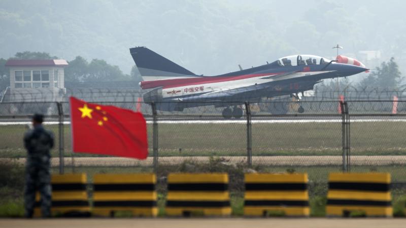 A Chinese J-10 fighter jet, the same model that intercepted U.S. aircraft earlier this week over the East China Sea, takes off from a runway in mainland China in 2014. A Chinese J-10 fighter jet, the same model that intercepted U.S. aircraft earlier this week over the East China Sea, takes off from a runway in mainland China in 2014.