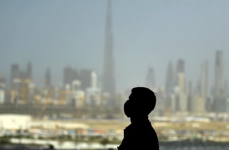A man wearing a protective mask in Dubai on March 23. A man wearing a protective mask in Dubai on March 23.
