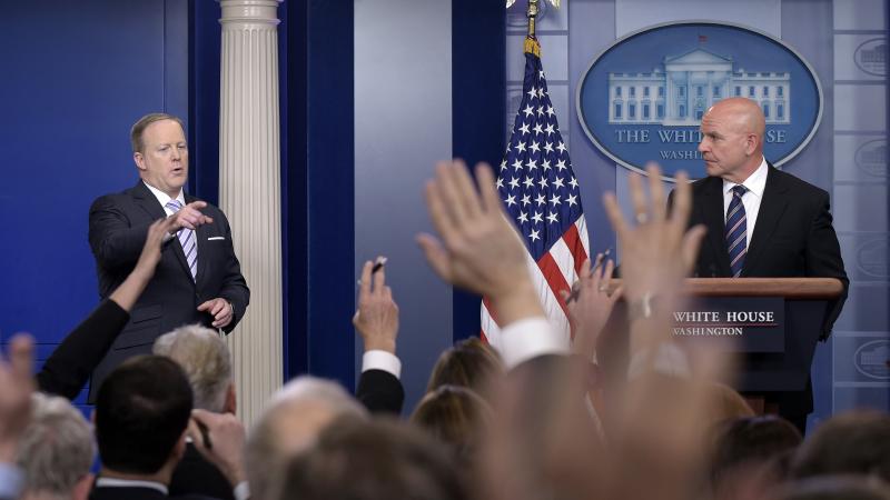 White House press secretary Sean Spicer, left, calls on a reporter during a press briefing appearance by national security adviser H.R. McMaster on Tuesday. White House press secretary Sean Spicer, left, calls on a reporter during a press briefing appearance by national security adviser H.R. McMaster on Tuesday.