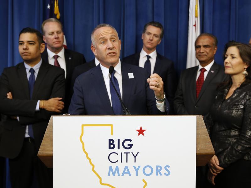 Sacramento Mayor Darrell Steinberg (center), head of Big City Mayors, discusses the homeless problem after the group met with California Gov. Gavin Newsom in March. Steinberg says it's time for any adversarial relationship between cities and the Trump adm Sacramento Mayor Darrell Steinberg (center), head of Big City Mayors, discusses the homeless problem after the group met with California Gov. Gavin Newsom in March. Steinberg says it's time for any adversarial relationship between cities and the Trump adm