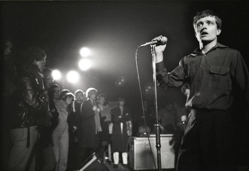 Singer Ian Curtis on stage in 1980 with Joy Division, whose song "Transmission" is among those explored in Greil Marcus' book The History of Rock 'N' Roll in Ten Songs. Singer Ian Curtis on stage in 1980 with Joy Division, whose song "Transmission" is among those explored in Greil Marcus' book The History of Rock 'N' Roll in Ten Songs.