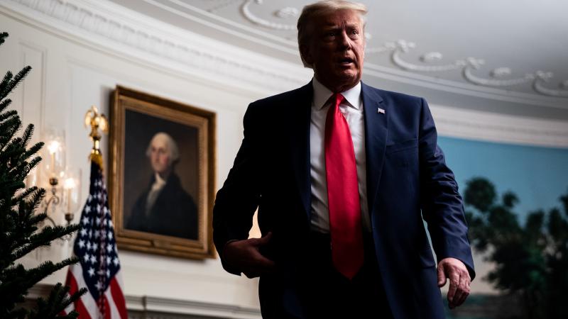 President Trump leaves after speaking in the Diplomatic Room of the White House on Thanksgiving. President Trump leaves after speaking in the Diplomatic Room of the White House on Thanksgiving.
