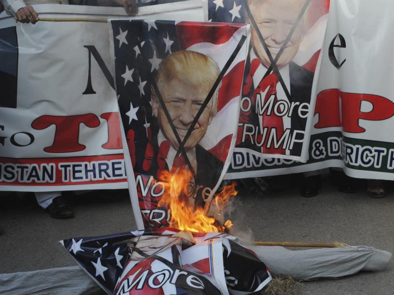 Protesters in Hyderabad, Pakistan, burn banners showing President Trump on Tuesday. Trump slammed Pakistan for "lies & deceit" in a New Year's Day tweet that said Islamabad had played U.S. leaders for "fools." Protesters in Hyderabad, Pakistan, burn banners showing President Trump on Tuesday. Trump slammed Pakistan for "lies & deceit" in a New Year's Day tweet that said Islamabad had played U.S. leaders for "fools."