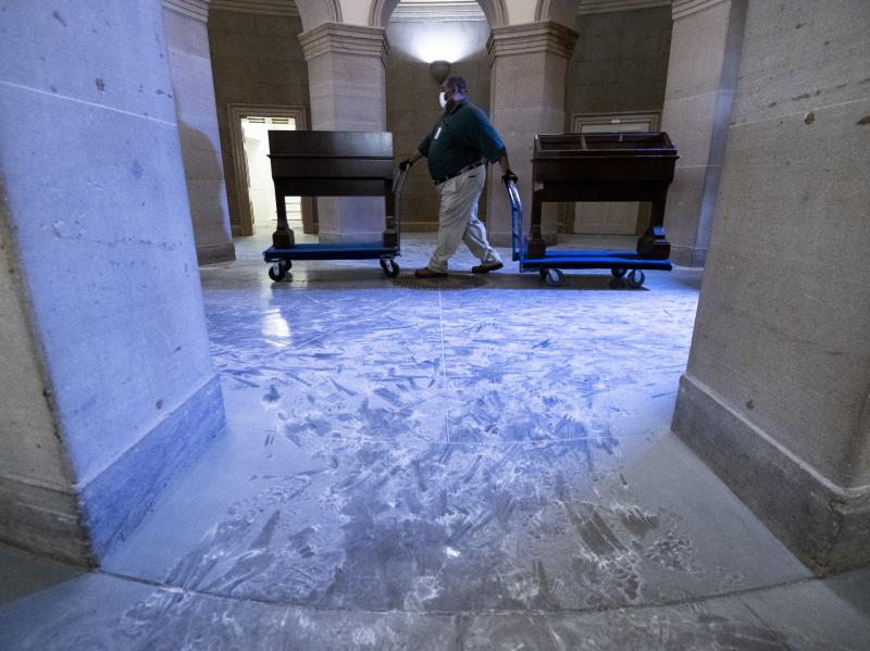Capitol workers remove damaged furniture on from the U.S. Capitol on January 7, 2021, following the riot at the Capitol the day before. Capitol workers remove damaged furniture on from the U.S. Capitol on January 7, 2021, following the riot at the Capitol the day before.