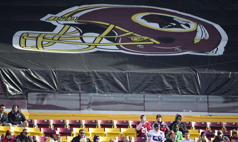 Fans sit in the stands before the start of a game between the New York Giants and Washington Redskins at FedEx Field in 2019 in Landover, Md. The Redskins, and other teams, are reviewing their names. Fans sit in the stands before the start of a game between the New York Giants and Washington Redskins at FedEx Field in 2019 in Landover, Md. The Redskins, and other teams, are reviewing their names.