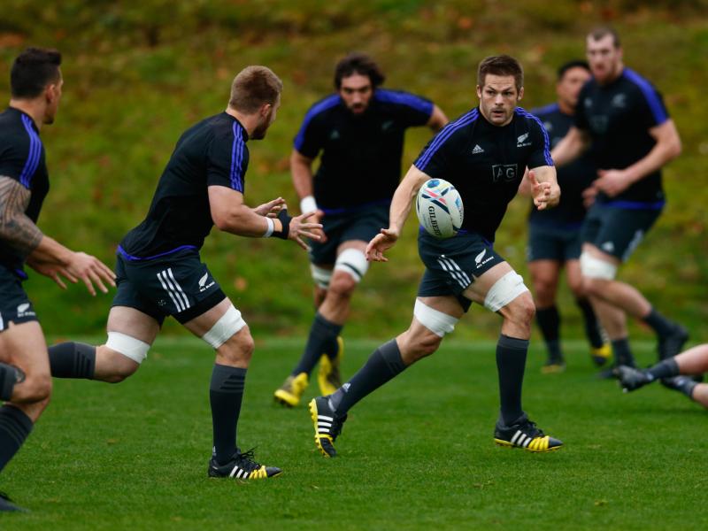 Richie McCaw of the All Blacks passes during a New Zealand training session on Friday in preparation for the World Cup final on Saturday. Richie McCaw of the All Blacks passes during a New Zealand training session on Friday in preparation for the World Cup final on Saturday.