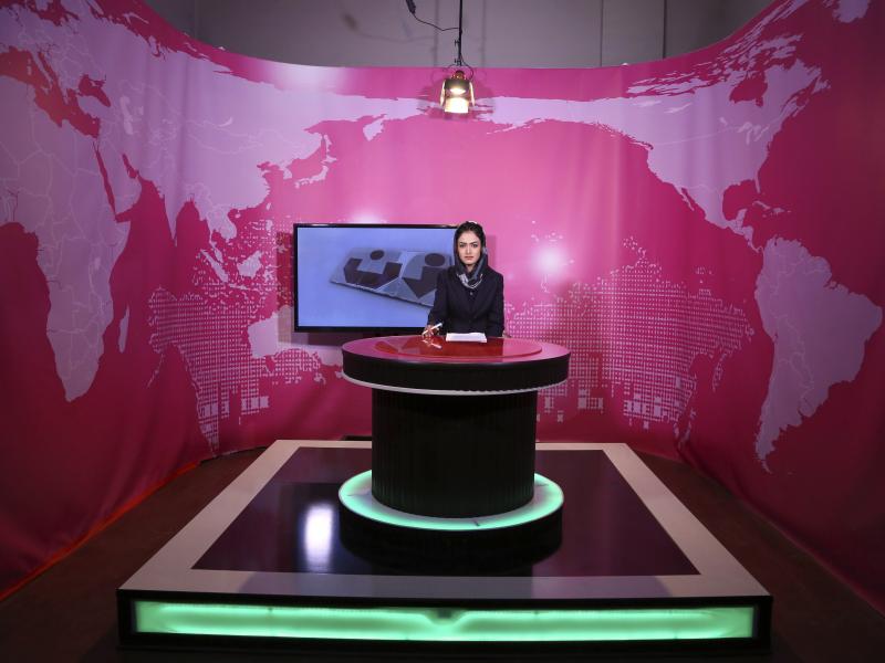 Basira Joya, 20, a news presenter, sits during recording at the Zan TV station (women's TV) in Kabul, Afghanistan, on May 30, 2017. Afghanistan's Taliban rulers ordered all female TV presenters to cover their faces on air, the country's biggest media outl Basira Joya, 20, a news presenter, sits during recording at the Zan TV station (women's TV) in Kabul, Afghanistan, on May 30, 2017. Afghanistan's Taliban rulers ordered all female TV presenters to cover their faces on air, the country's biggest media outl