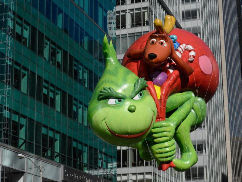 The Grinch balloon floats above New York City during the 2017 Macy's Thanksgiving Day parade. This week, real-life Grinches have been trying to steal Christmas cheer. The Grinch balloon floats above New York City during the 2017 Macy's Thanksgiving Day parade. This week, real-life Grinches have been trying to steal Christmas cheer.