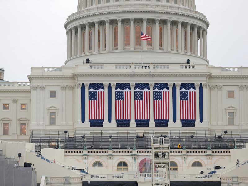 Wednesday's inauguration, coming two weeks to the day after the insurrection on the Capitol, will be unlike any other in living memory, writes NPR's Michel Martin. Above, the Capitol building is seen as workers prepare for the inauguration ceremony for Ba Wednesday's inauguration, coming two weeks to the day after the insurrection on the Capitol, will be unlike any other in living memory, writes NPR's Michel Martin. Above, the Capitol building is seen as workers prepare for the inauguration ceremony for Ba