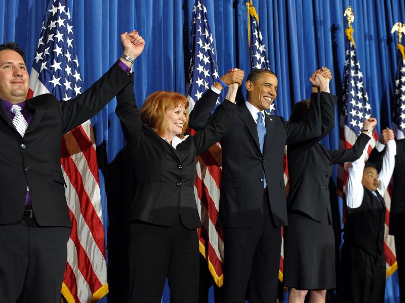 President Barack Obama celebrates with lawmakers after signing into law the Patient Protection and Affordable Care Act health insurance bill in March 2010. President Barack Obama celebrates with lawmakers after signing into law the Patient Protection and Affordable Care Act health insurance bill in March 2010.