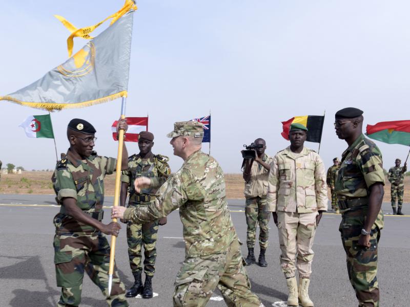 Senegalese Army Gen. Amadou Kane (left) receives the 2016 Flintlock flag from U.S. Army Gen. Donald Bolduc during the inauguration of a military base in Thiès, Senegal, in February 2016, during a three-week joint military exercise between African, U.S. a Senegalese Army Gen. Amadou Kane (left) receives the 2016 Flintlock flag from U.S. Army Gen. Donald Bolduc during the inauguration of a military base in Thiès, Senegal, in February 2016, during a three-week joint military exercise between African, U.S. a
