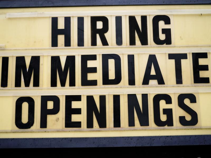 A hiring sign is posted outside a business in Huntingdon Valley, Pa., on Feb. 22. Employers are keen for workers as the economy continues to recover from the pandemic. A hiring sign is posted outside a business in Huntingdon Valley, Pa., on Feb. 22. Employers are keen for workers as the economy continues to recover from the pandemic.