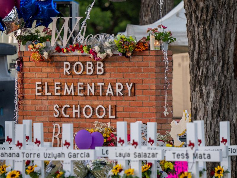 A memorial is seen outside Robb Elementary School in Uvalde, Texas, following the attack there this week in which 19 students and two adults were killed. A memorial is seen outside Robb Elementary School in Uvalde, Texas, following the attack there this week in which 19 students and two adults were killed.
