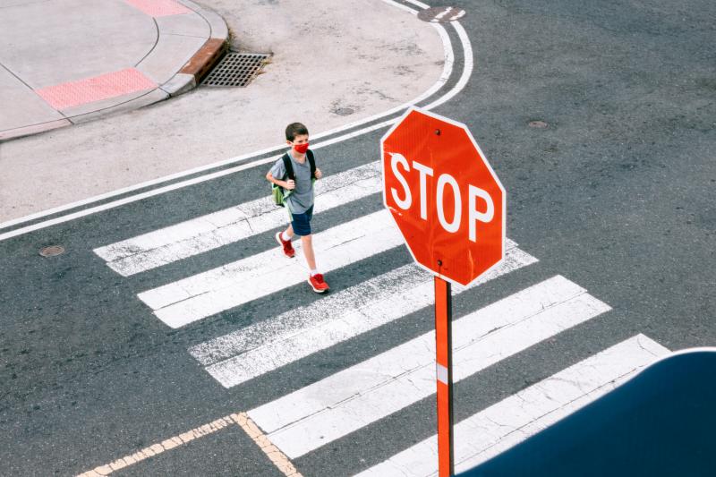 A boy on his commute to school during COVID-19 times A boy on his commute to school during COVID-19 times