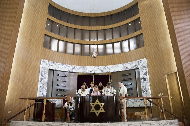 Adri Quiñones, center, leads the prayer during Saturday morning Shabbat services at Beth Shalom on Jan. 18, 2020. Adri Quiñones, center, leads the prayer during Saturday morning Shabbat services at Beth Shalom on Jan. 18, 2020.