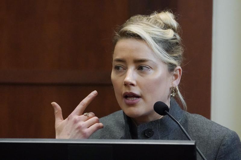 Actor Amber Heard testifies in the courtroom at the Fairfax County Circuit Courthouse in Fairfax, Va., on Monday. Actor Johnny Depp sued his ex-wife for libel in Fairfax County Circuit Court after she wrote an op-ed piece in The Washington Post in 2018 re Actor Amber Heard testifies in the courtroom at the Fairfax County Circuit Courthouse in Fairfax, Va., on Monday. Actor Johnny Depp sued his ex-wife for libel in Fairfax County Circuit Court after she wrote an op-ed piece in The Washington Post in 2018 re